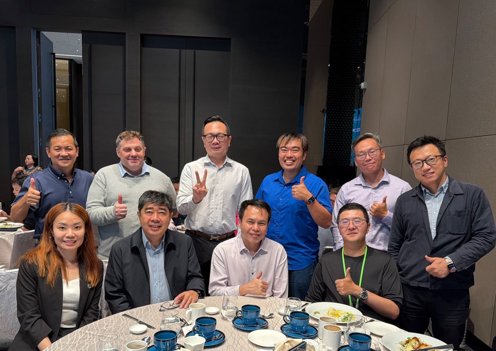 Standards partners gathered around a lunch table
